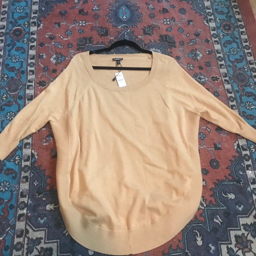 Circle hem tunic sweater